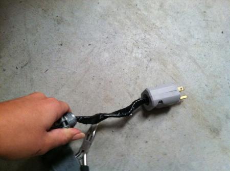 image: The plug hooked up and taped